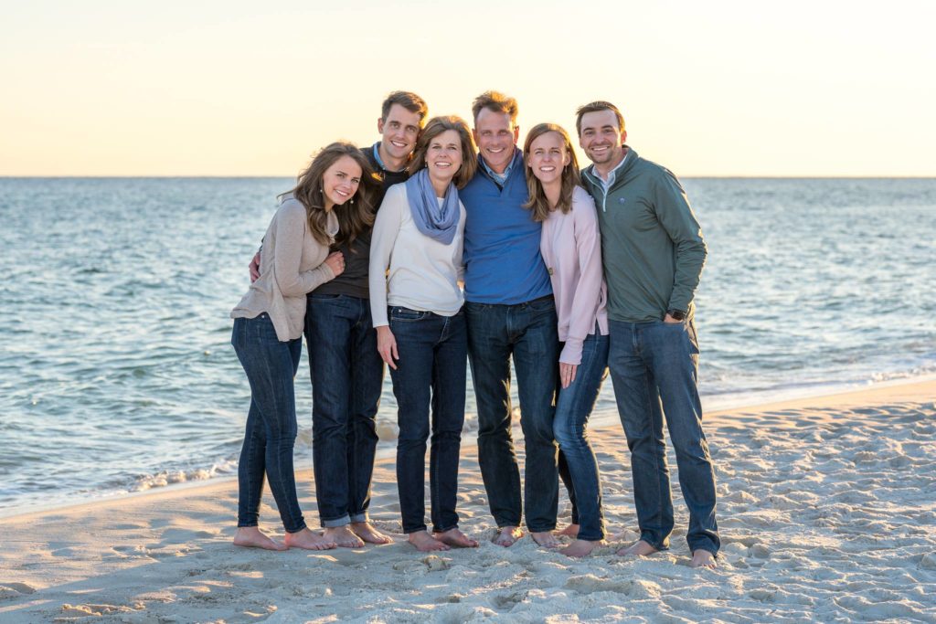 Photographer gulf shores alabama photo of a family at the beach in a group hug